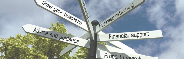 Fingerpost displaying all directions of travel for services within our district